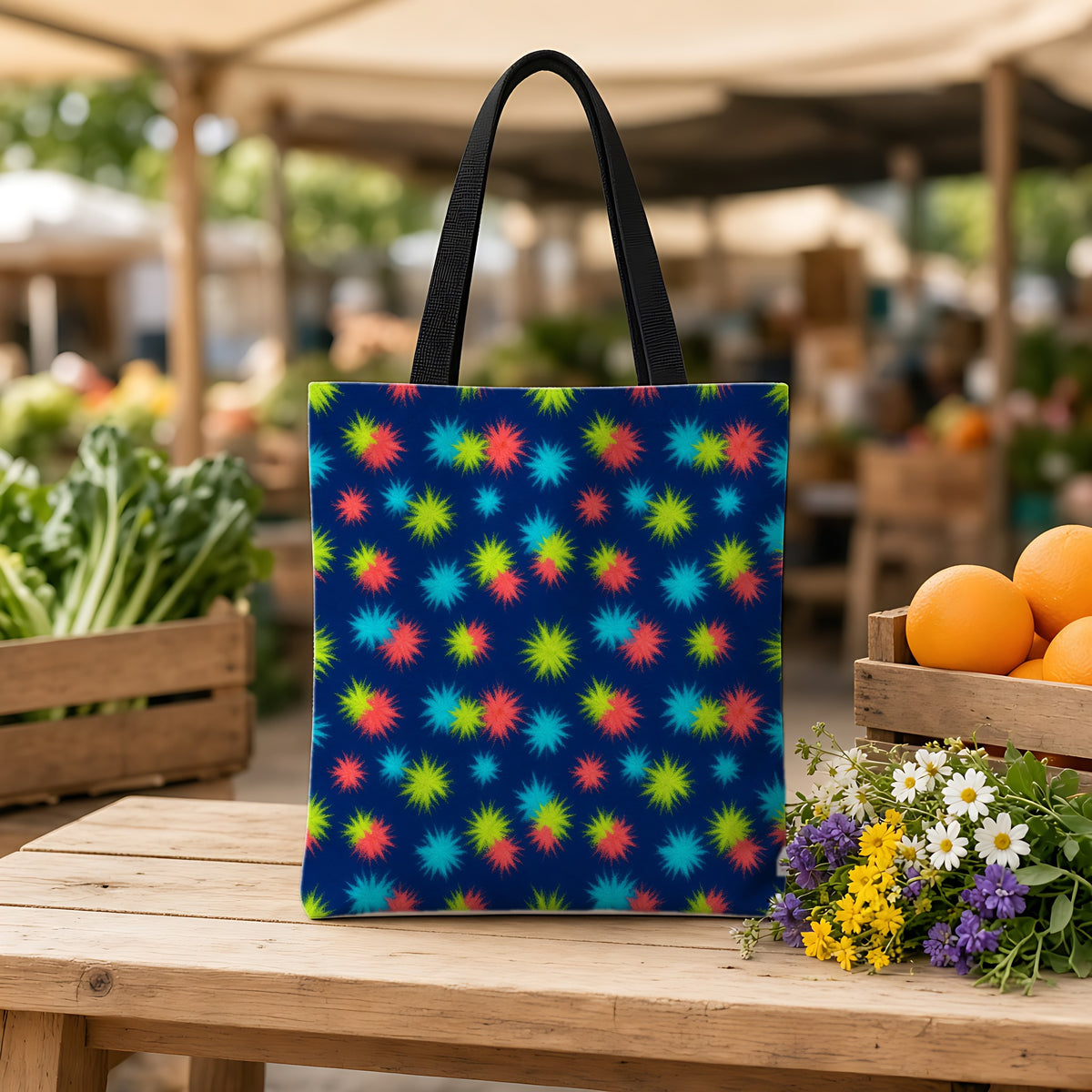 Dye Drop Spread Weekender Tote Bag on a wooden bench at a farmers market