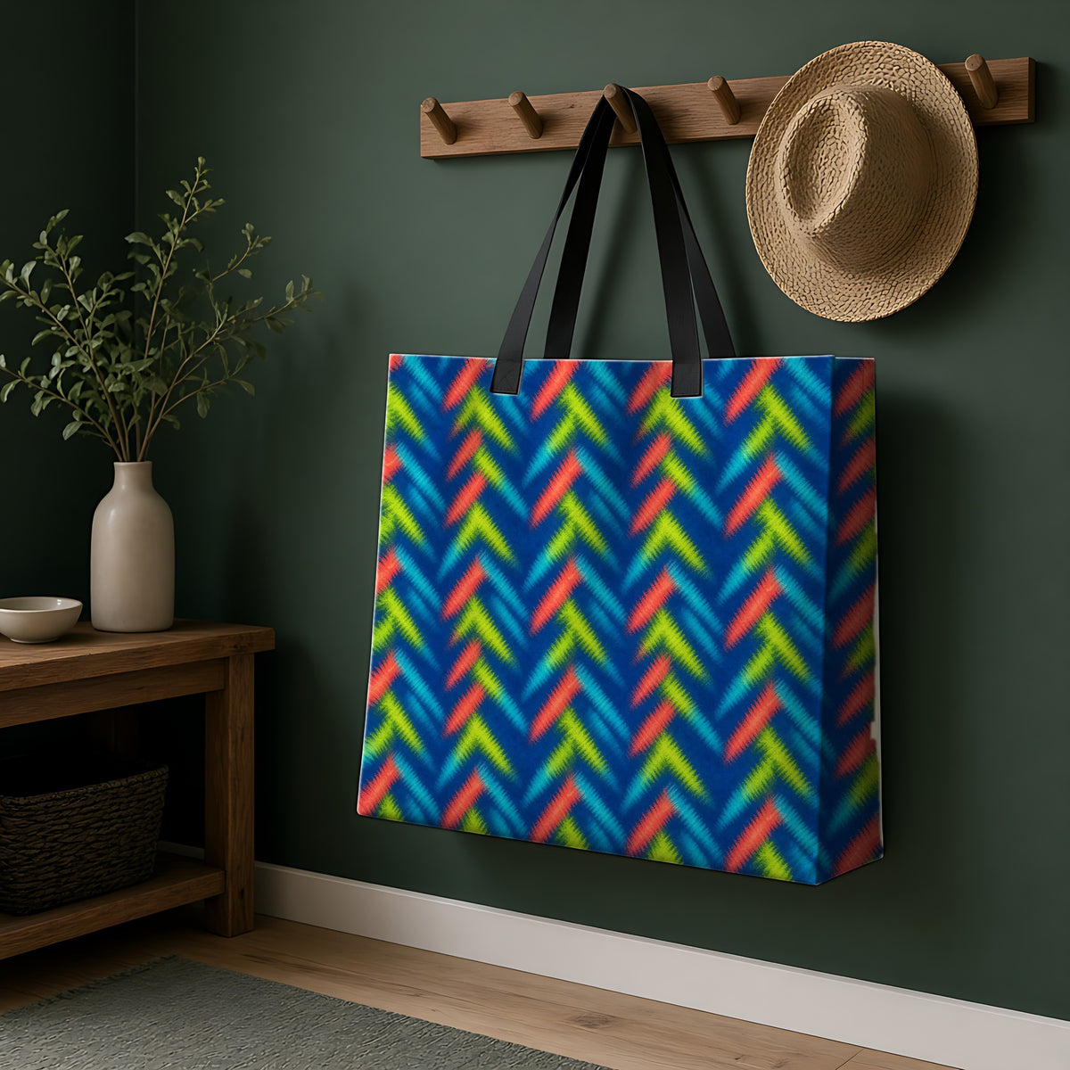 Neon Zigzag Fold Weekender Tote Bag hanging on a peg rail in a green hallway