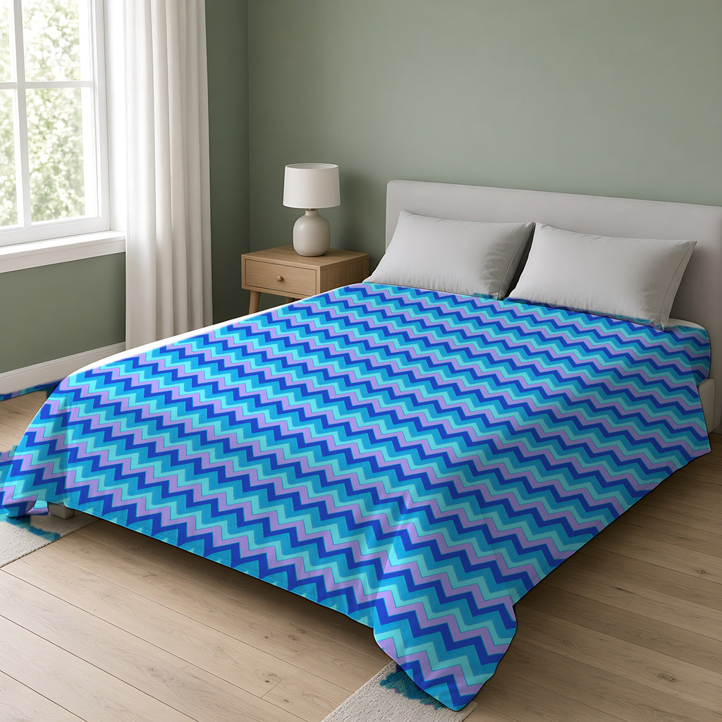 Jewel Chevron Bands Cotton Duvet Cover on a double bed in a bright sage-green bedroom