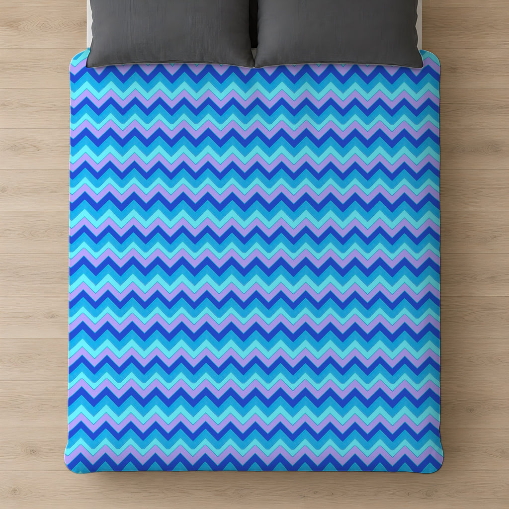 Jewel Chevron Bands Cotton Duvet Cover on a bed, seen from above