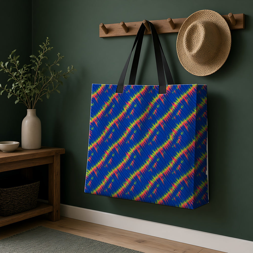 Diagonal Wrap Dye Weekender Tote Bag hanging on a peg rail in a green hallway
