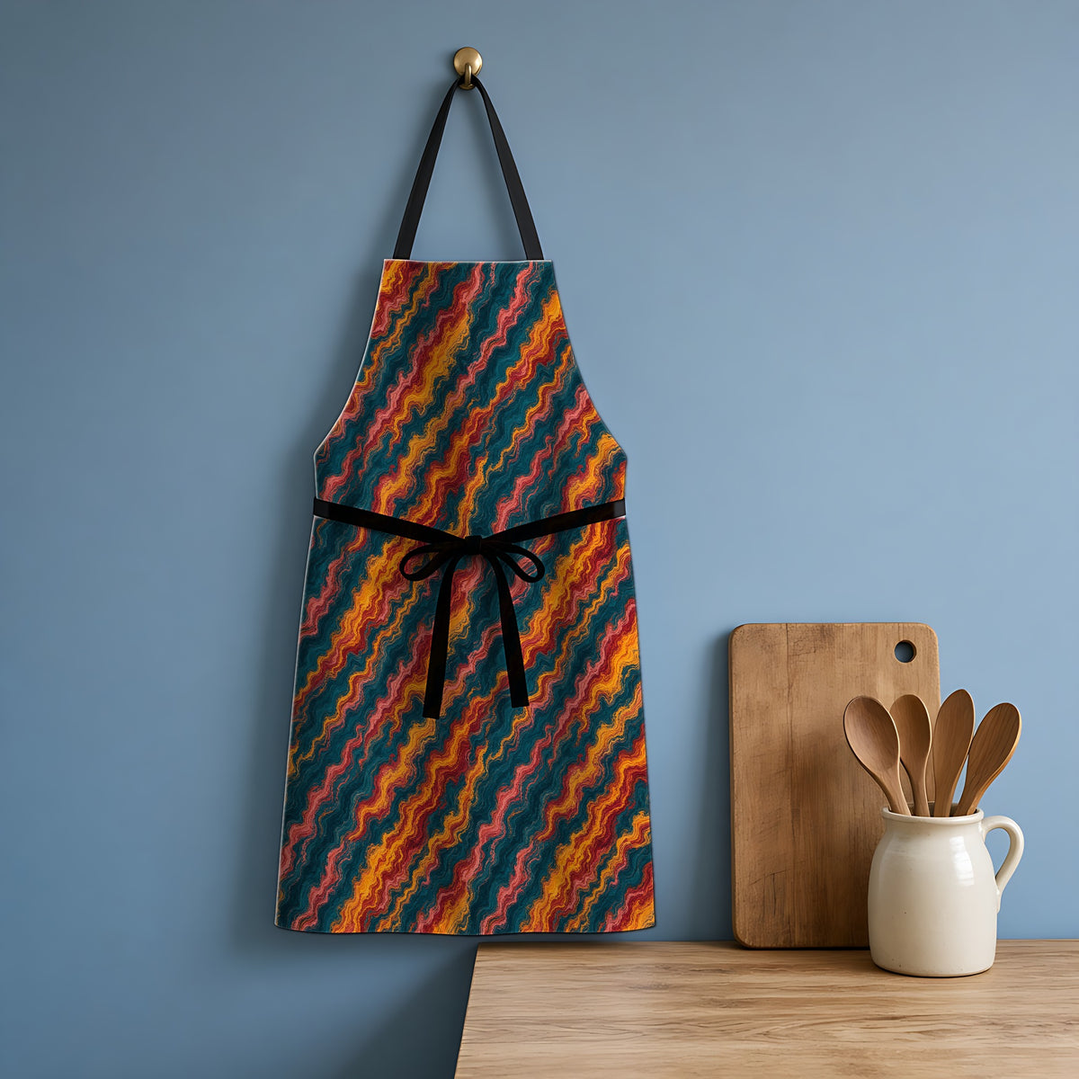 Stretched Veins Apron hanging in a blue kitchen