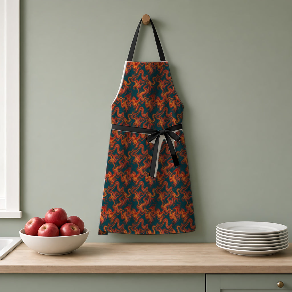 Serpentine Comb Apron hanging on a sage-green kitchen wall