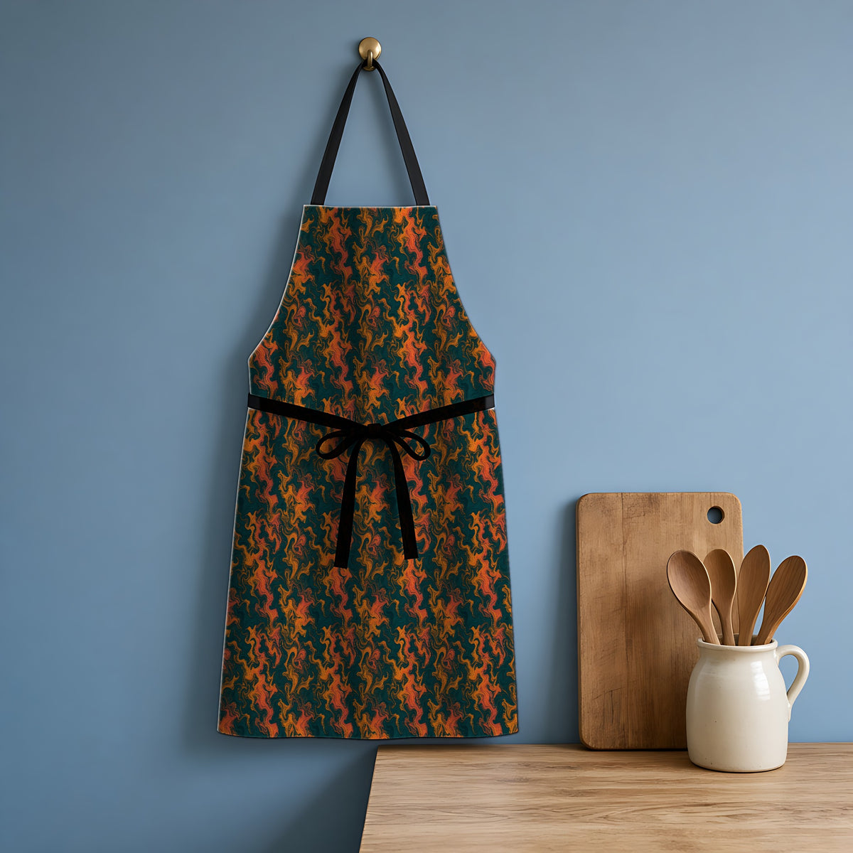 Swirl Vein Marble Apron hanging in a blue kitchen