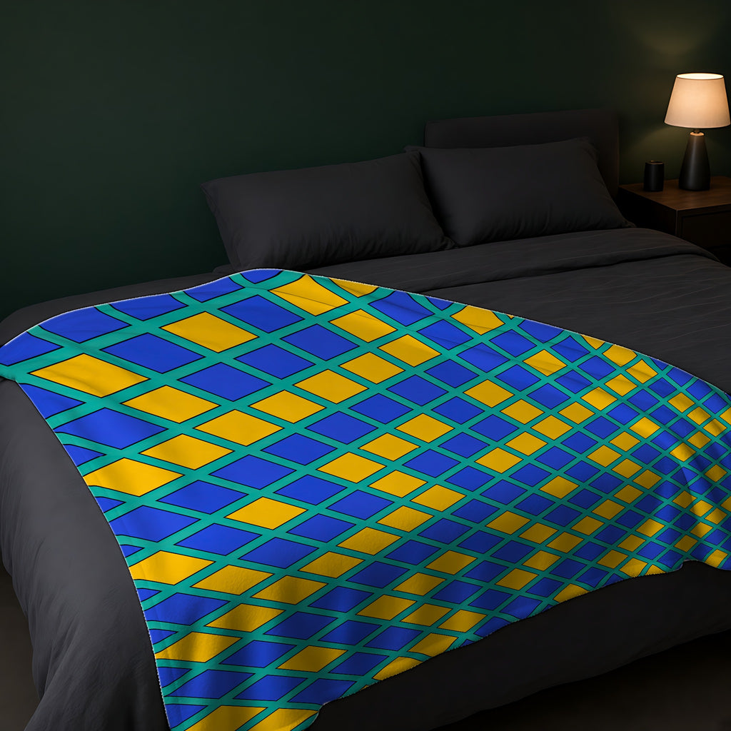 Harlequin Gold Grid Sherpa Fleece Blanket across the foot of a dark bed