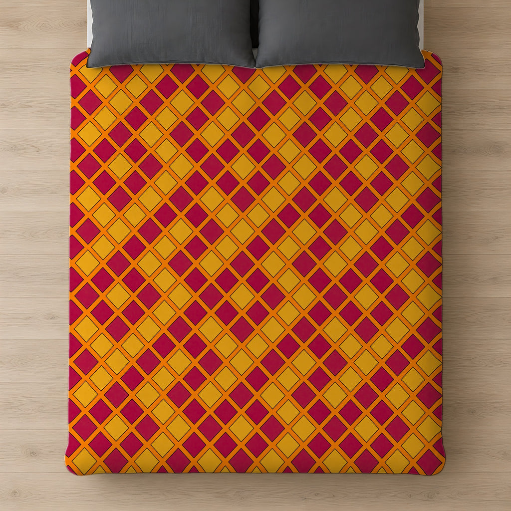 Harlequin Gold Grid Cotton Duvet Cover on a bed, seen from above