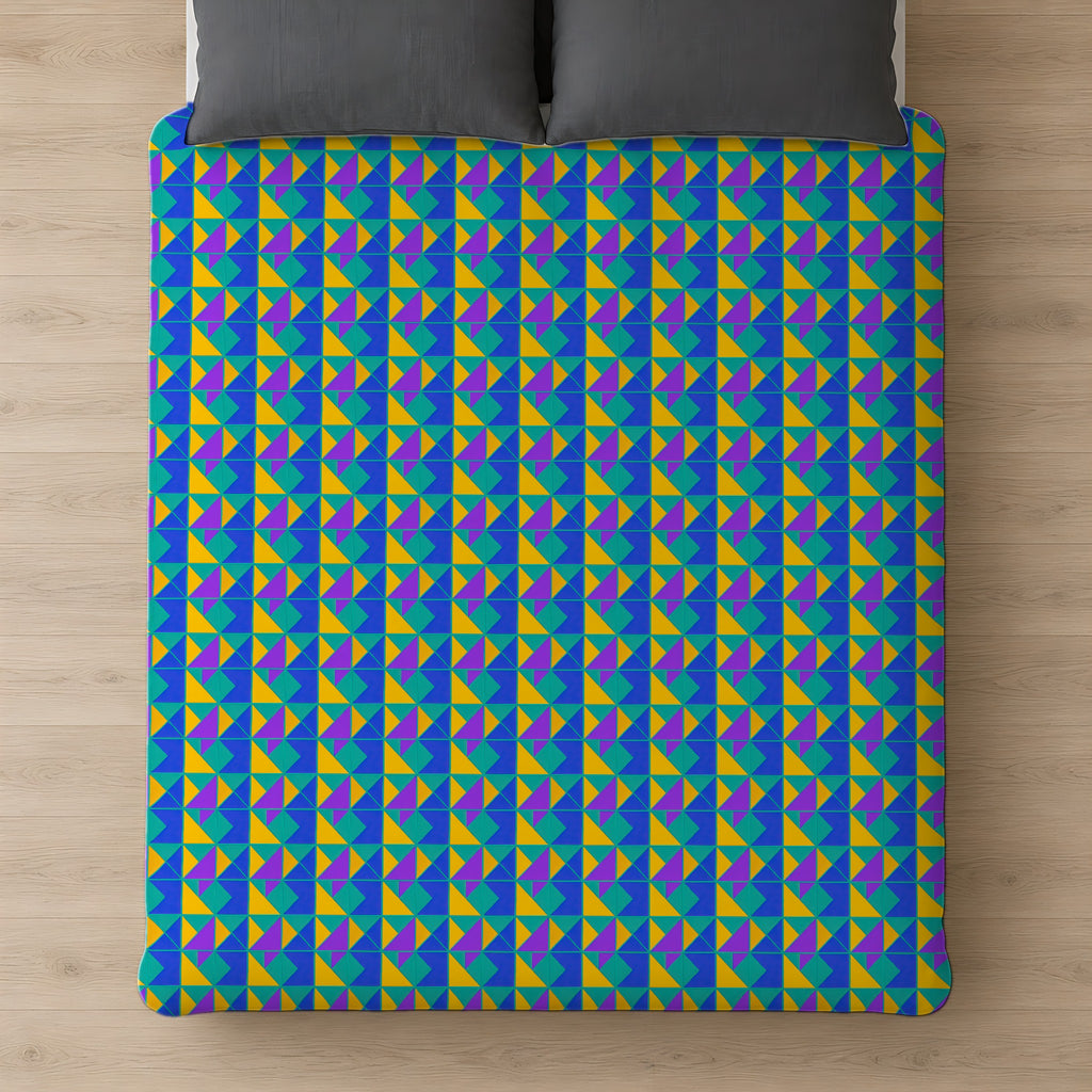 Jewel Block Quilt Comforter on a bed, seen from above