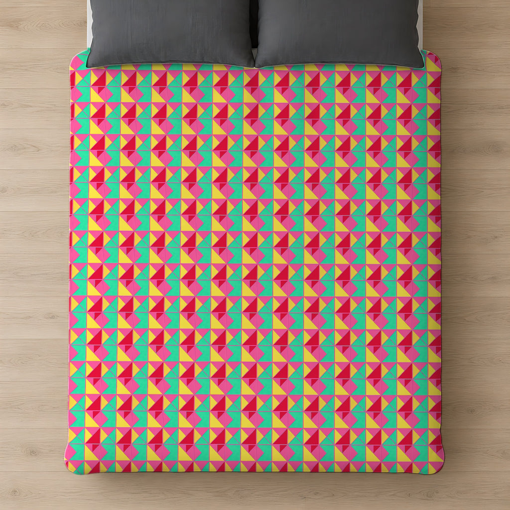 Jewel Block Quilt Comforter on a bed, seen from above