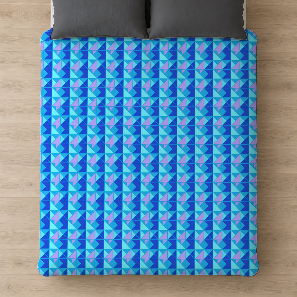 Jewel Block Quilt Cotton Duvet Cover on a bed, seen from above
