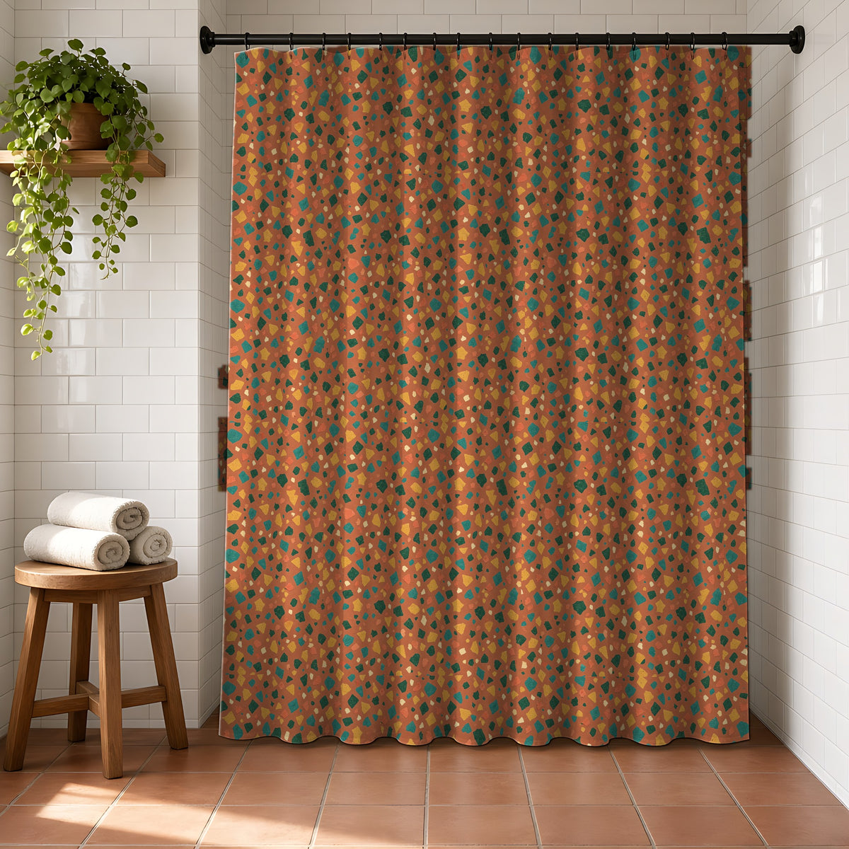 Jewel Chip Terrazzo Shower Curtain in a bright bathroom with white tiles and a terracotta floor