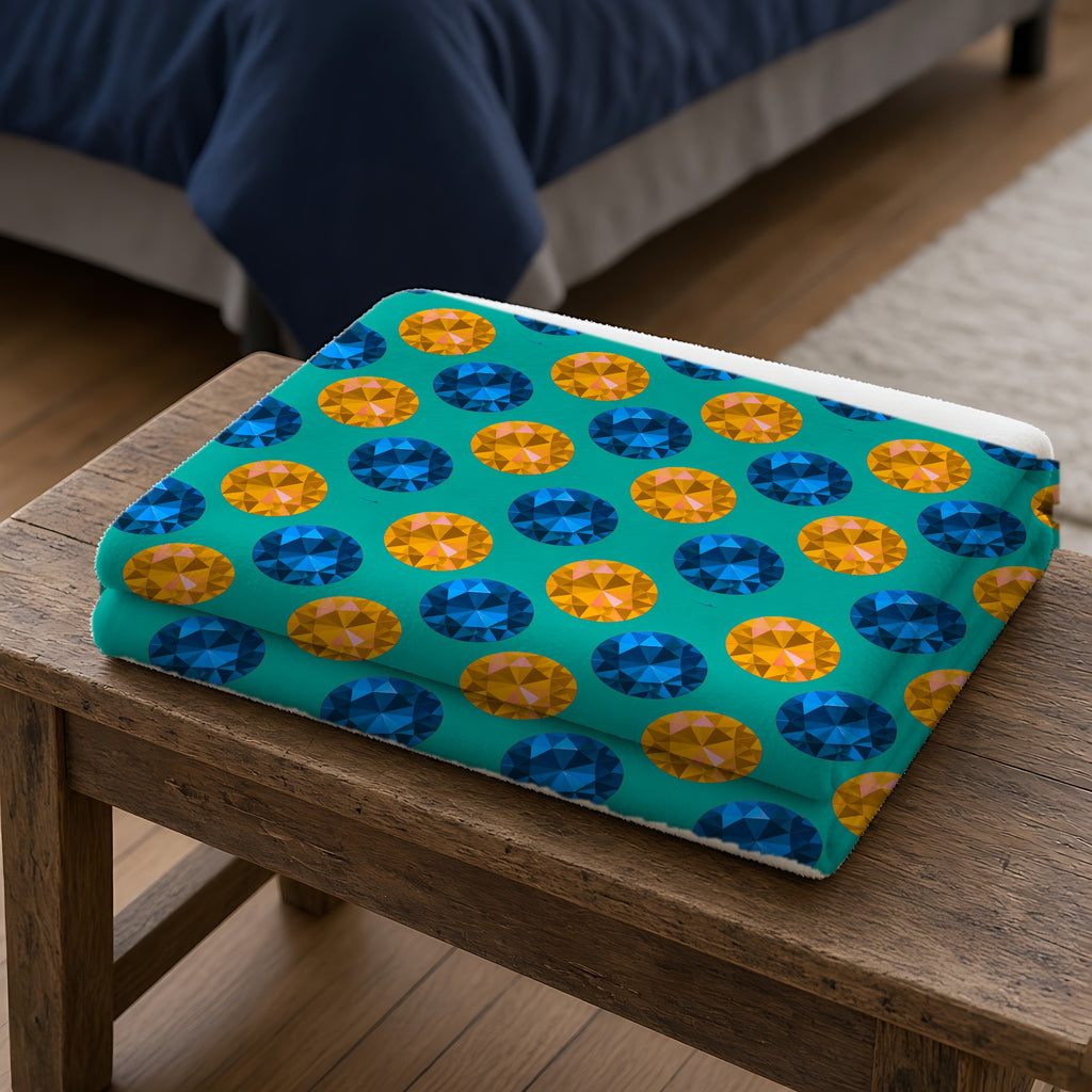 Half-Drop Gem Grid Sherpa Fleece Blanket folded on a wooden bench