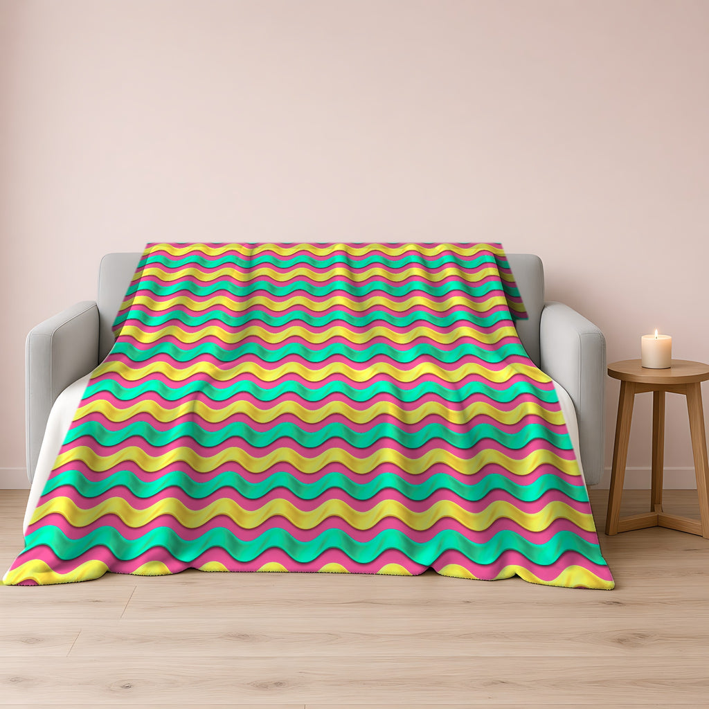 Satin Wave Bands Sherpa Fleece Blanket draped over a grey sofa