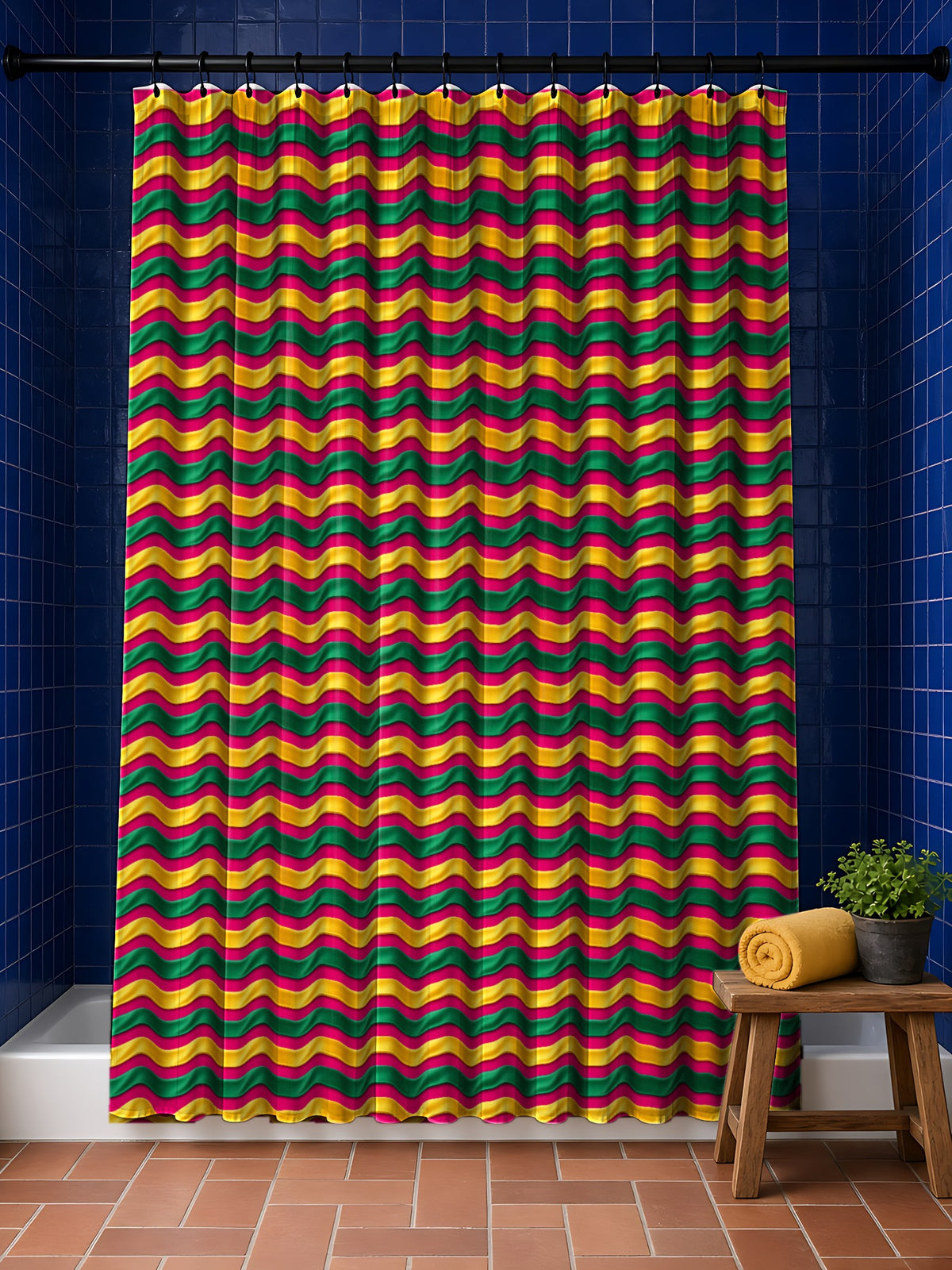 Satin Wave Bands shower curtain in the Festive Jewel Bright palette, hanging in a bathroom with cobalt tiles and a terracotta floor