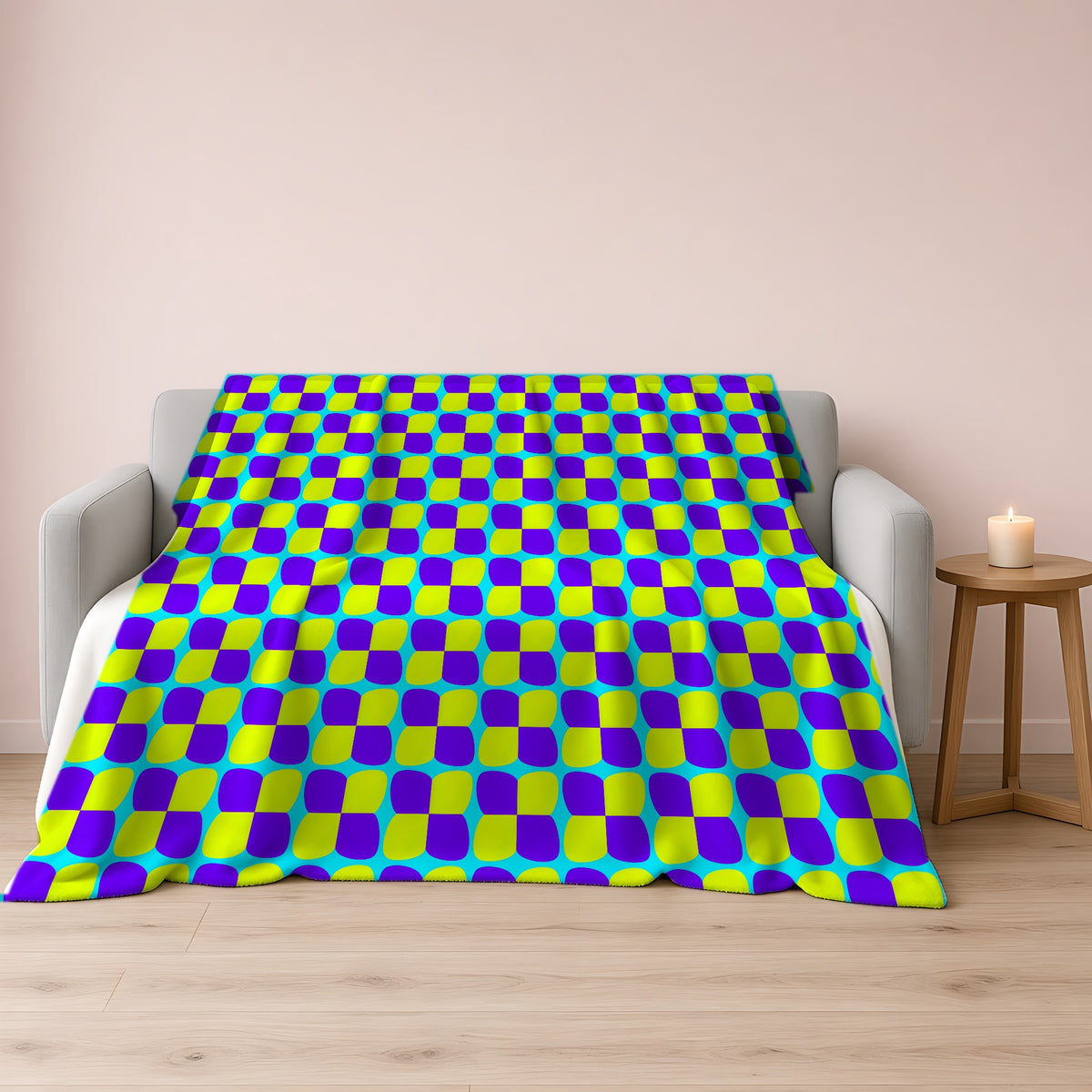 Bold Bulge Checker Sherpa Fleece Blanket draped over a grey sofa