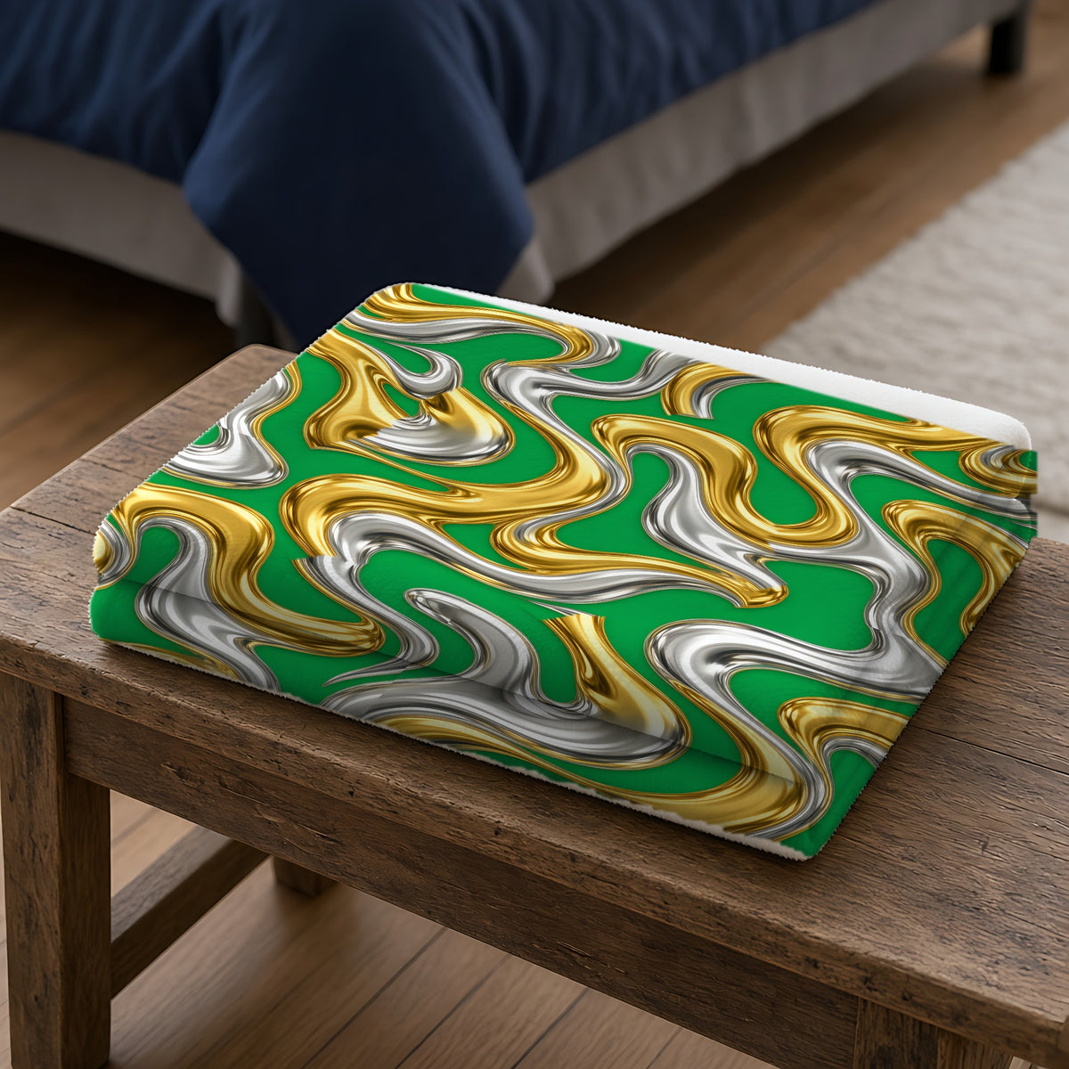 Broad Melting Gold Ribbons Sherpa Fleece Blanket folded on a wooden bench