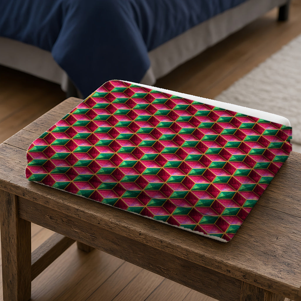 Faceted Cube Illusion Sherpa Fleece Blanket folded on a wooden bench