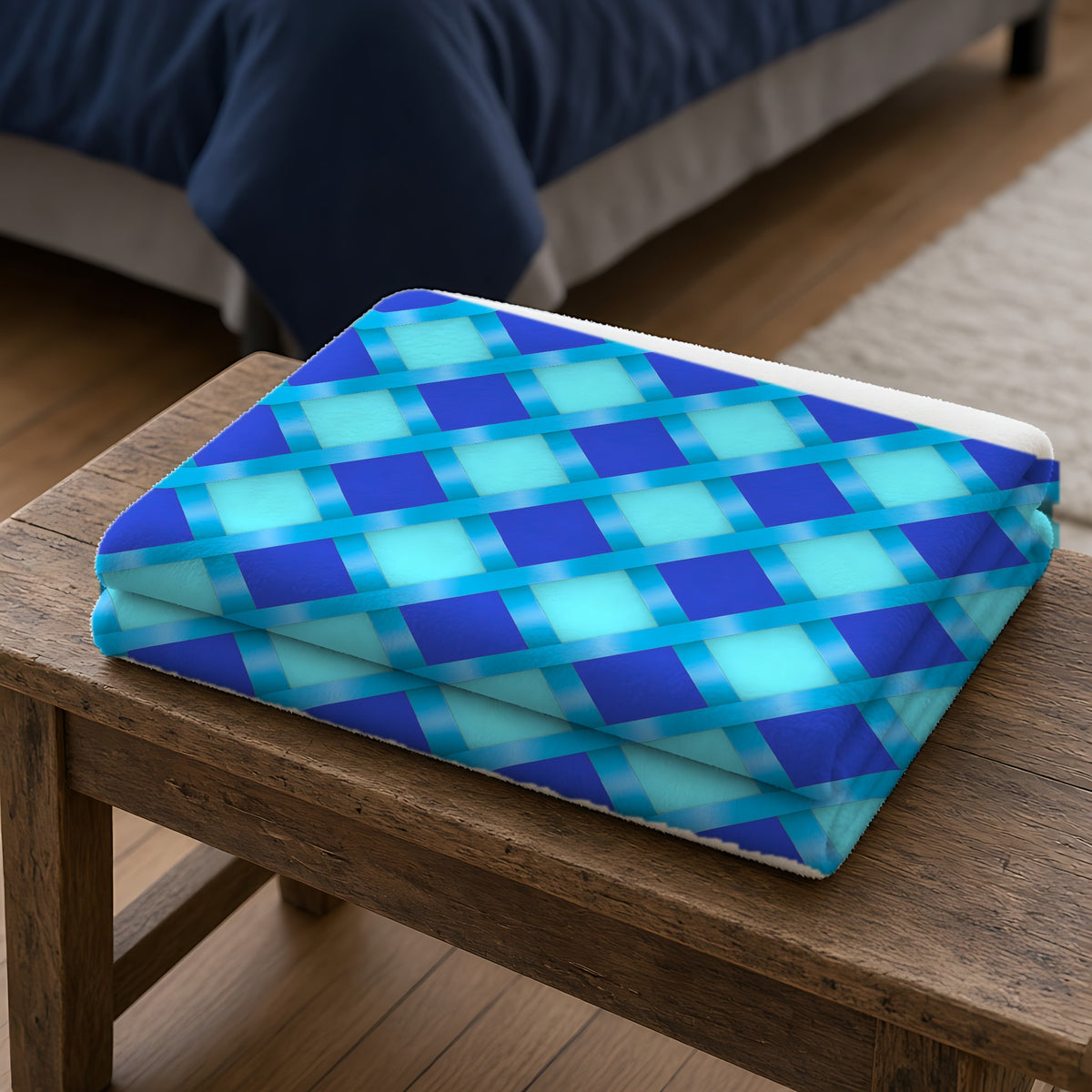 Broad Diamond Trellis Sherpa Fleece Blanket folded on a wooden bench