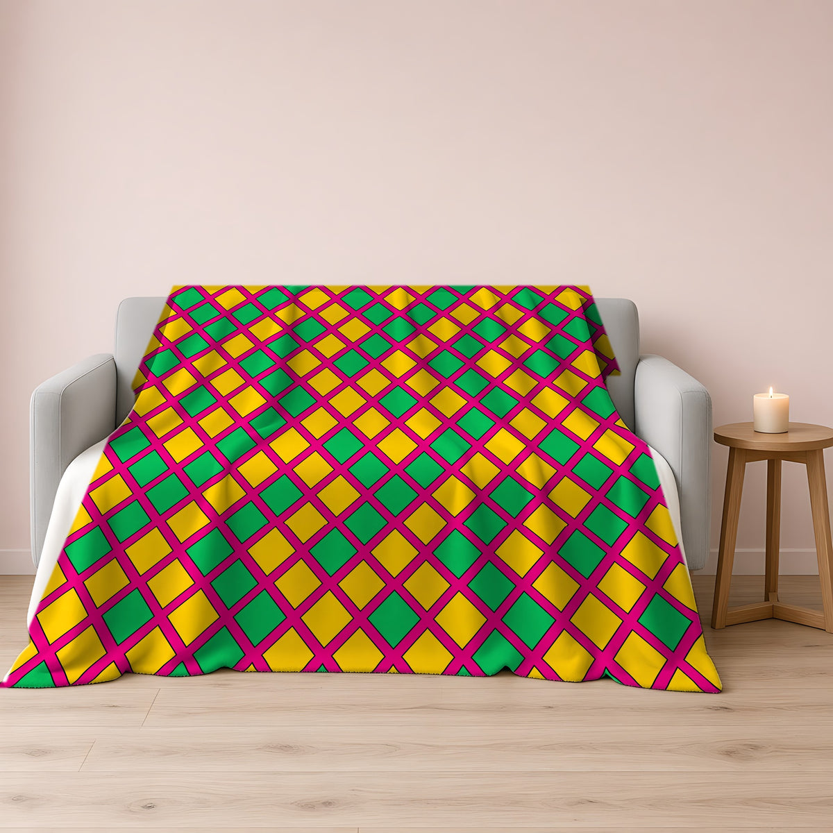 Harlequin Gold Grid Sherpa Fleece Blanket draped over a grey sofa