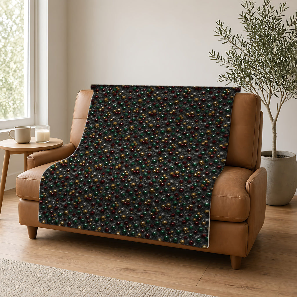 Jewel Bubble Clusters Sherpa Fleece Blanket draped over a caramel leather sofa