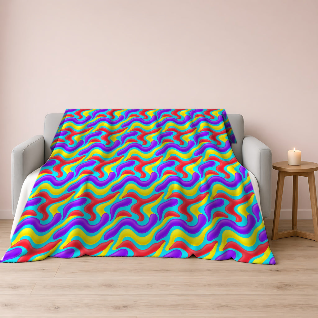 Liquid Band Ripple Sherpa Fleece Blanket draped over a grey sofa