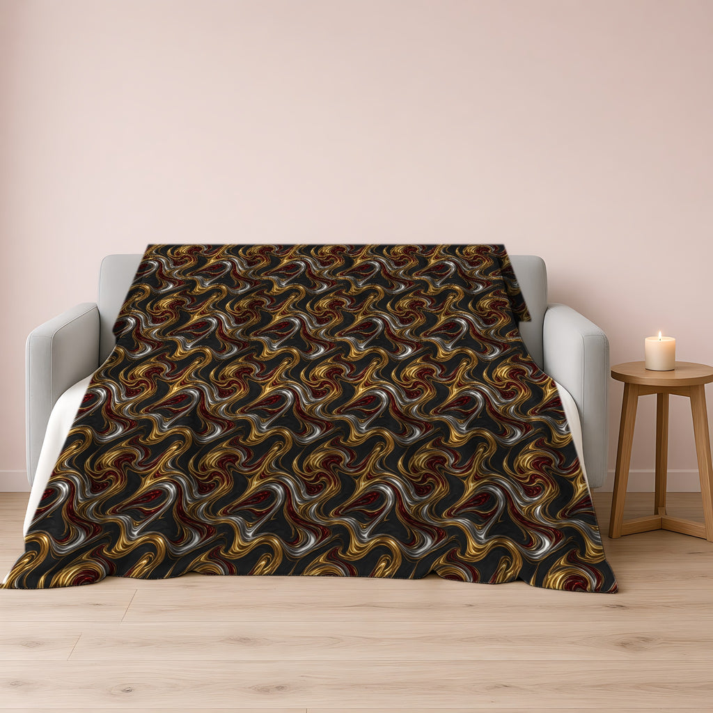 Melting Gold Ribbons Sherpa Fleece Blanket draped over a grey sofa