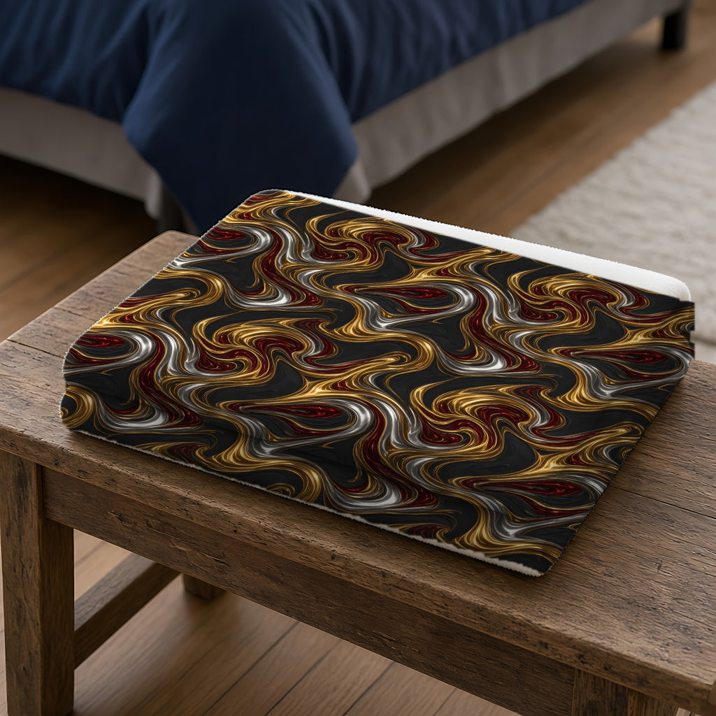 Melting Gold Ribbons Sherpa Fleece Blanket folded on a wooden bench