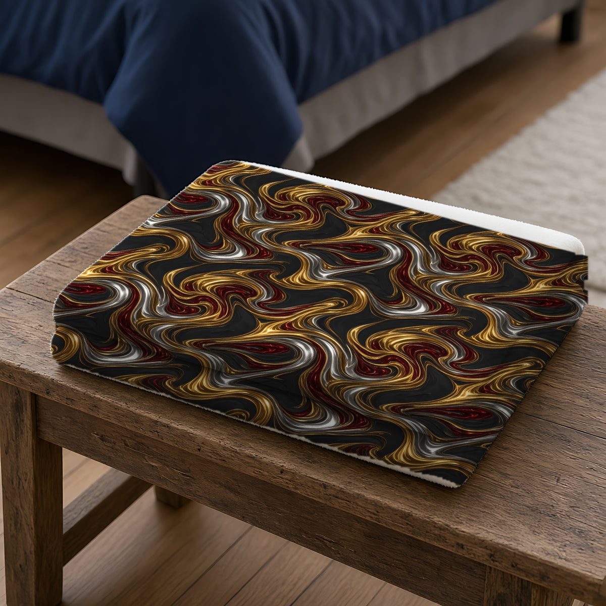 Melting Gold Ribbons Sherpa Fleece Blanket folded on a wooden bench