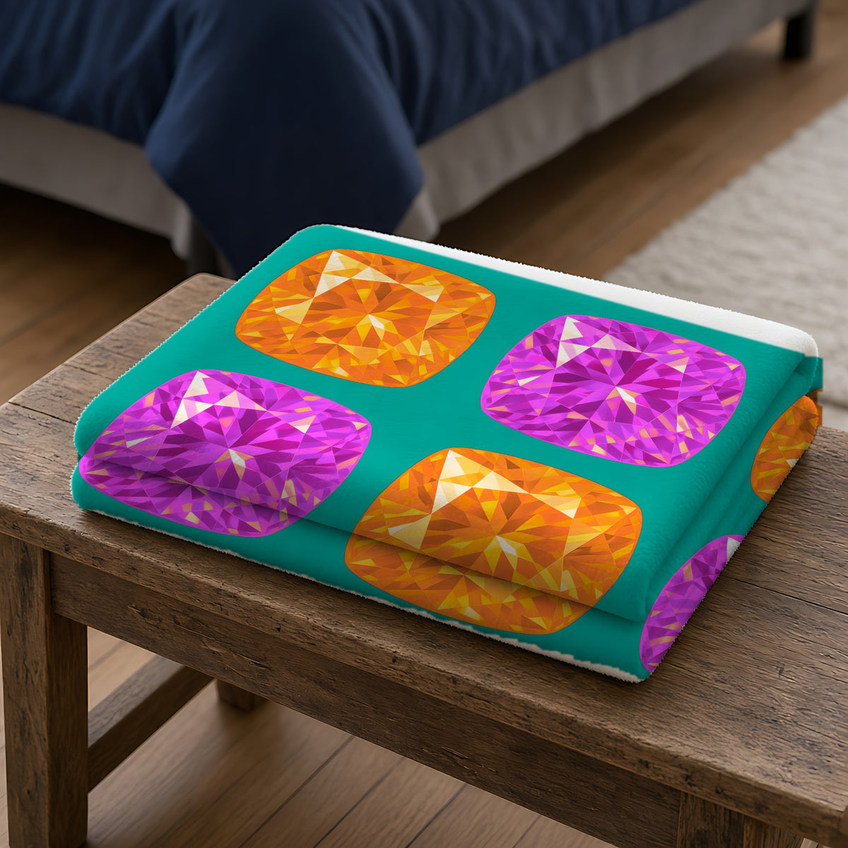 Giant Cut Gem Grid Sherpa Fleece Blanket folded on a wooden bench