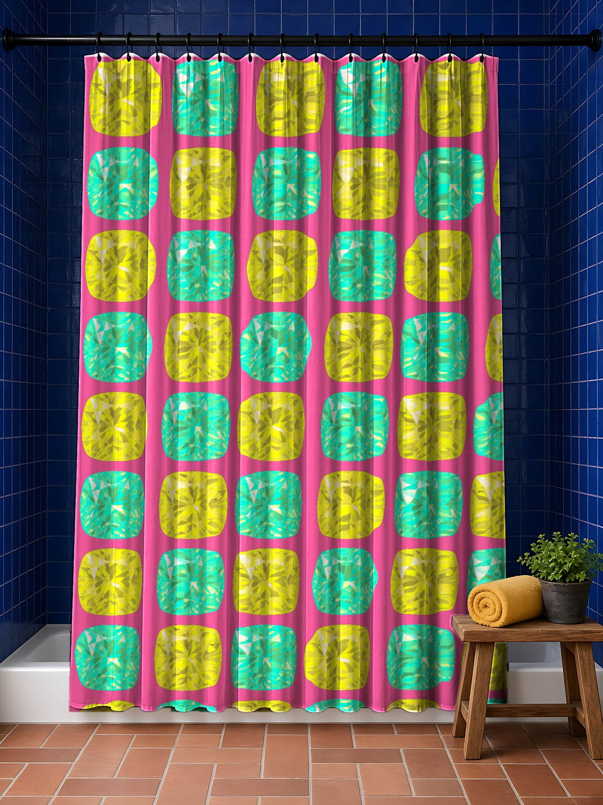 Giant Cut Gem Grid Shower Curtain in the Candy Christmas palette, hanging in a bathroom with cobalt tiles and a terracotta floor