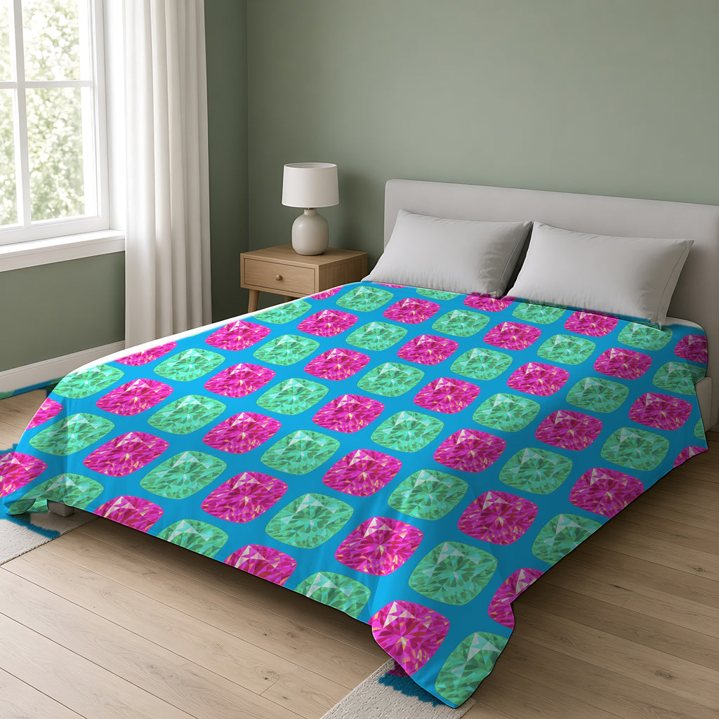 Giant Cut Gem Grid Comforter on a double bed in a bright sage-green bedroom