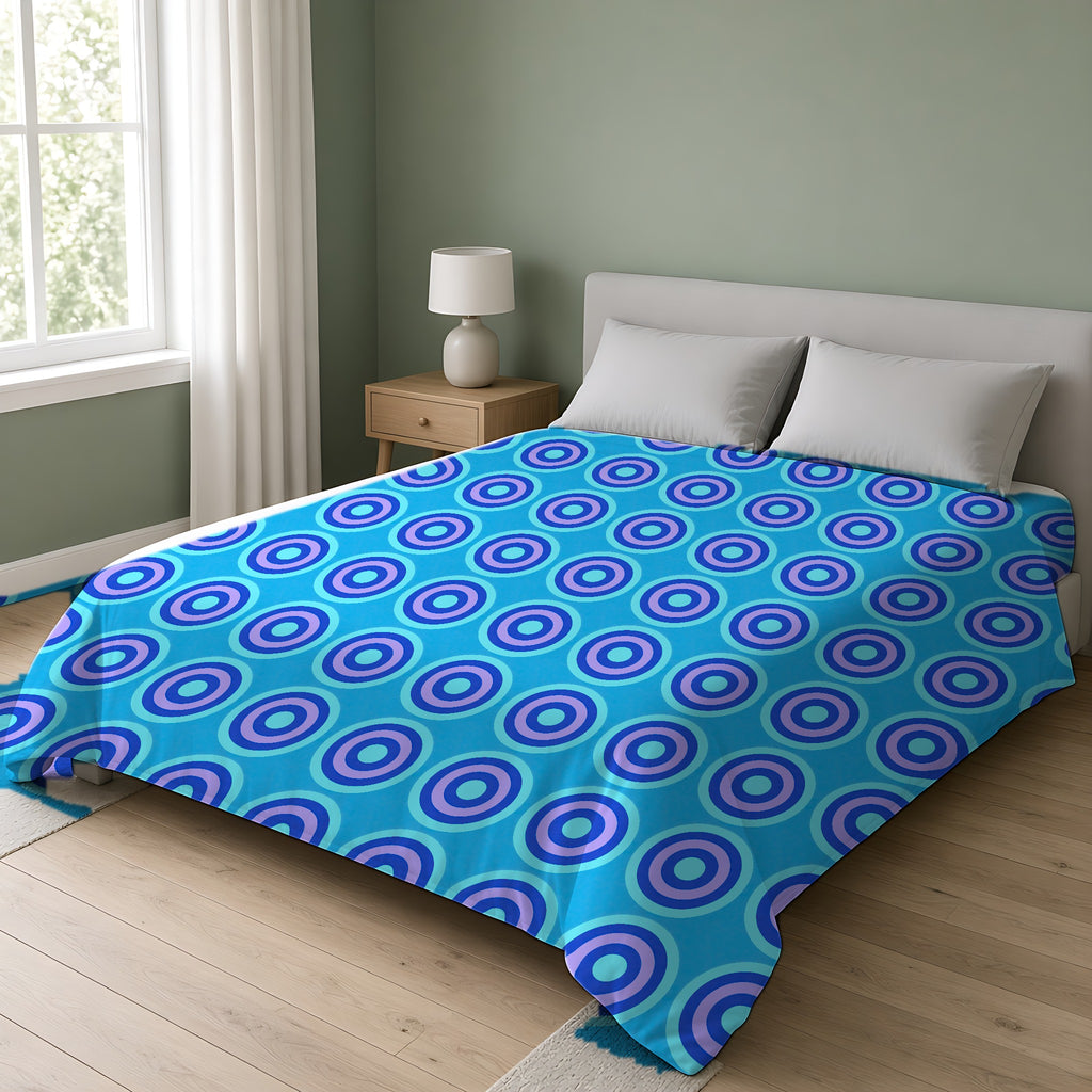 Mega Ring Grid Comforter on a double bed in a bright sage-green bedroom