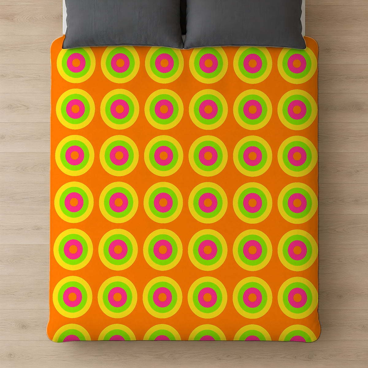Giant Op-Art Jewel Rings Cotton Duvet Cover on a bed, seen from above
