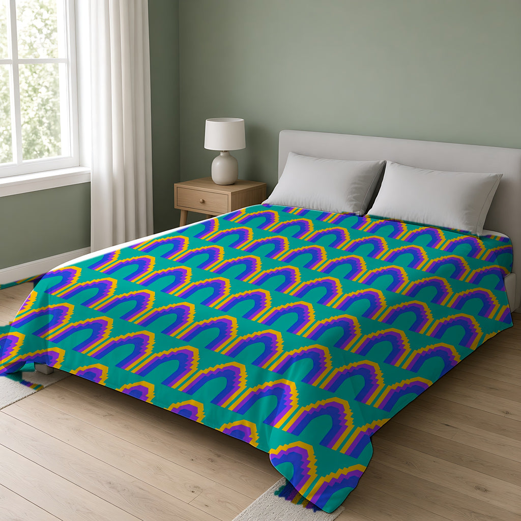 Grand Stepped Arches Comforter on a double bed in a bright sage-green bedroom
