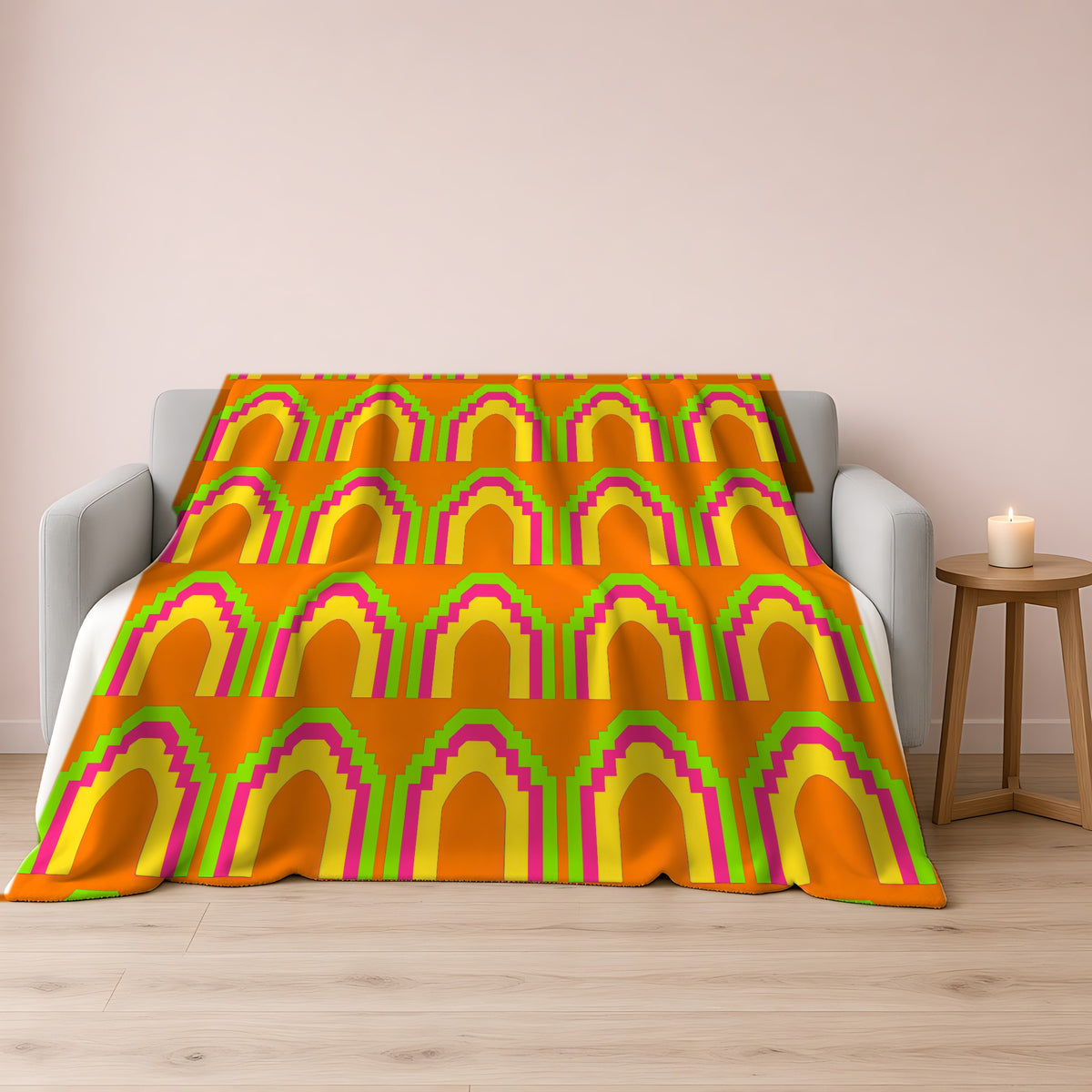 Grand Stepped Arches Sherpa Fleece Blanket draped over a grey sofa