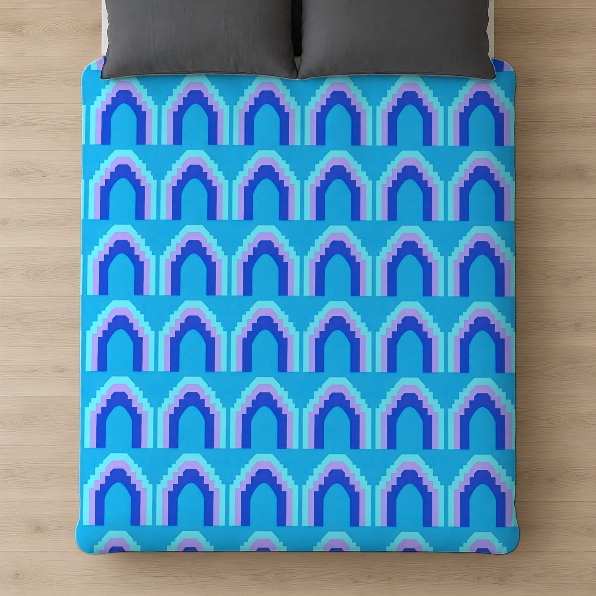 Grand Stepped Arches Comforter on a bed, seen from above