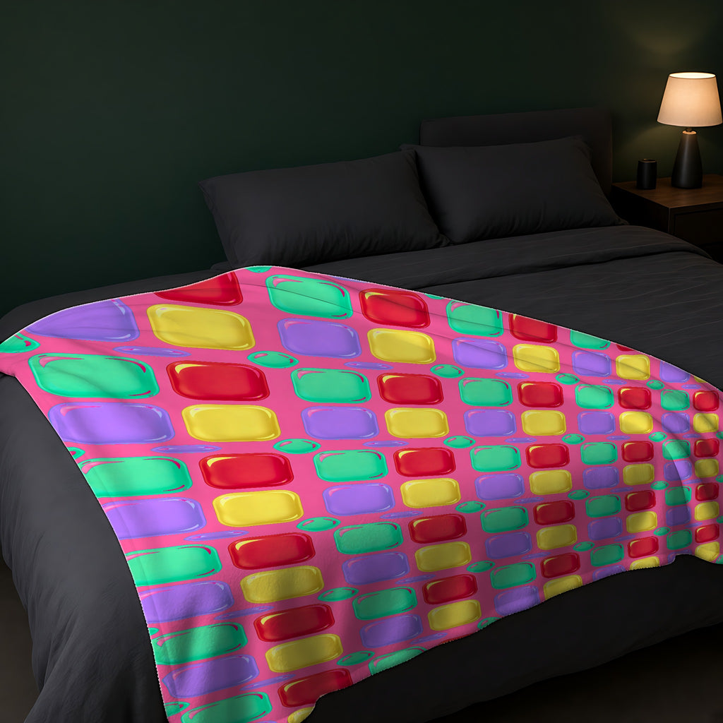 Giant Puffy Glass Cushions Sherpa Fleece Blanket across the foot of a dark bed