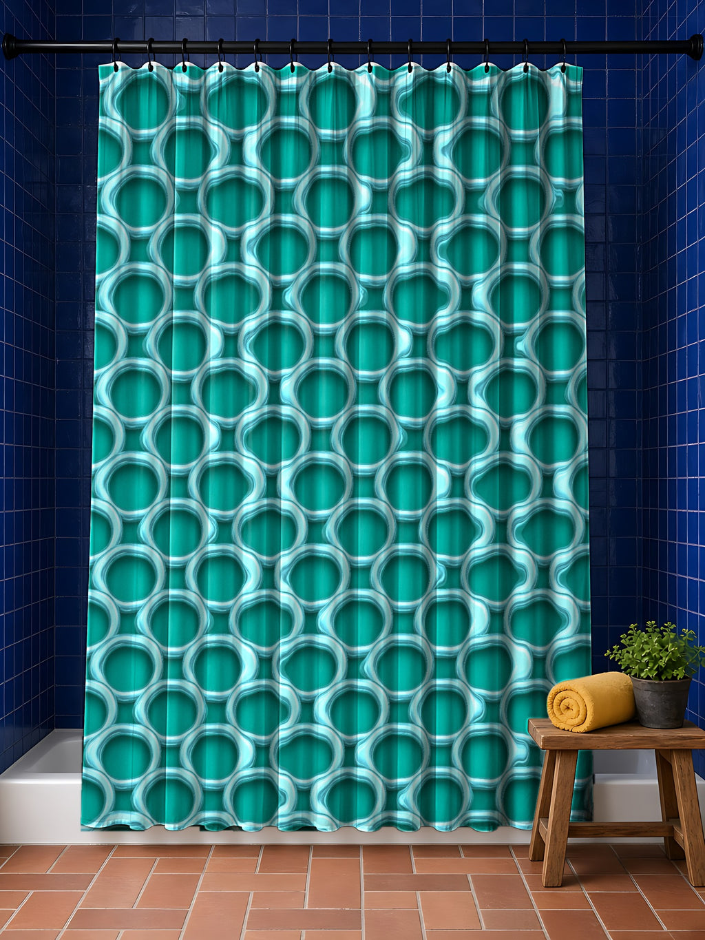 Big Ring Weave Shower Curtain in the Peacock Jewel palette, hanging in a bathroom with cobalt tiles and a terracotta floor