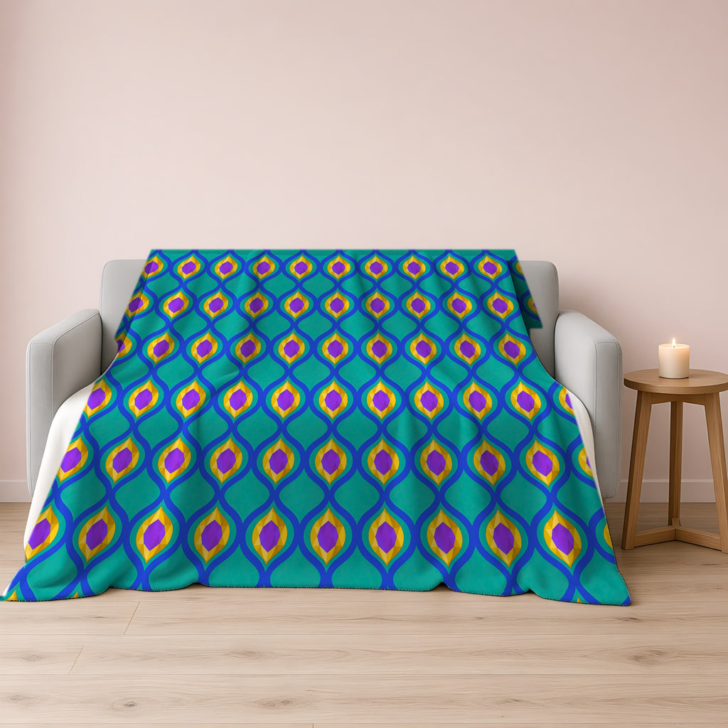 Grand Gold Ogee Lattice II Sherpa Fleece Blanket draped over a grey sofa