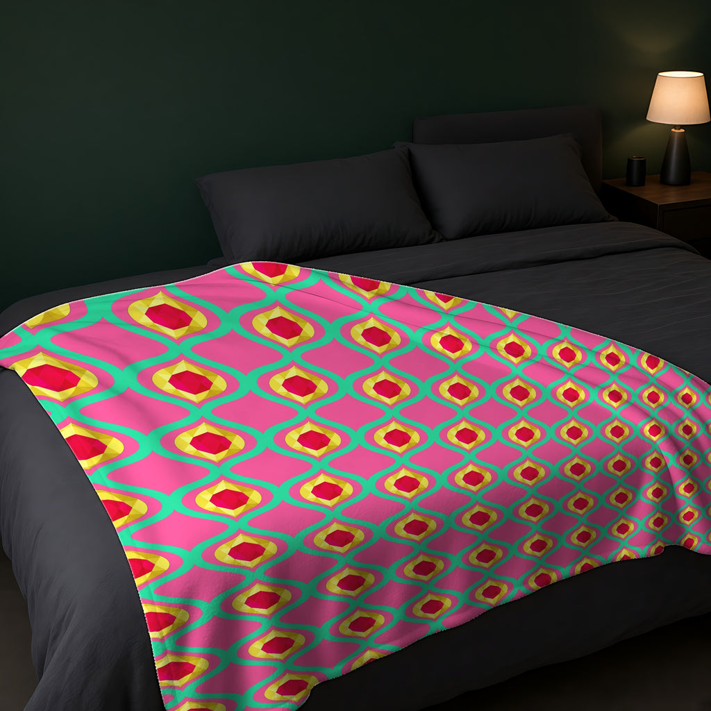 Grand Gold Ogee Lattice II Sherpa Fleece Blanket across the foot of a dark bed