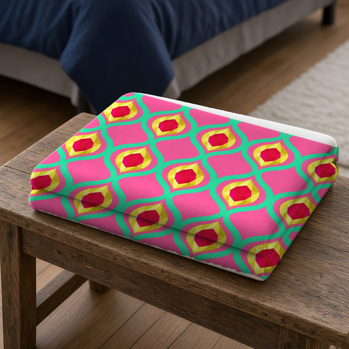 Grand Gold Ogee Lattice II Sherpa Fleece Blanket folded on a wooden bench