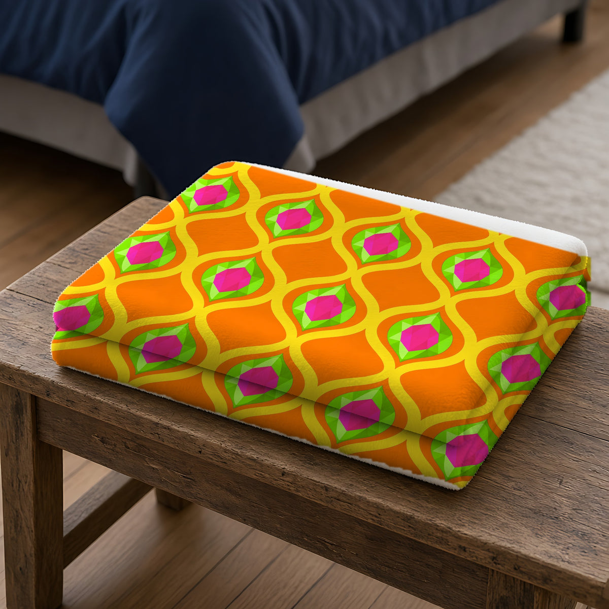 Grand Gold Ogee Lattice II Sherpa Fleece Blanket folded on a wooden bench