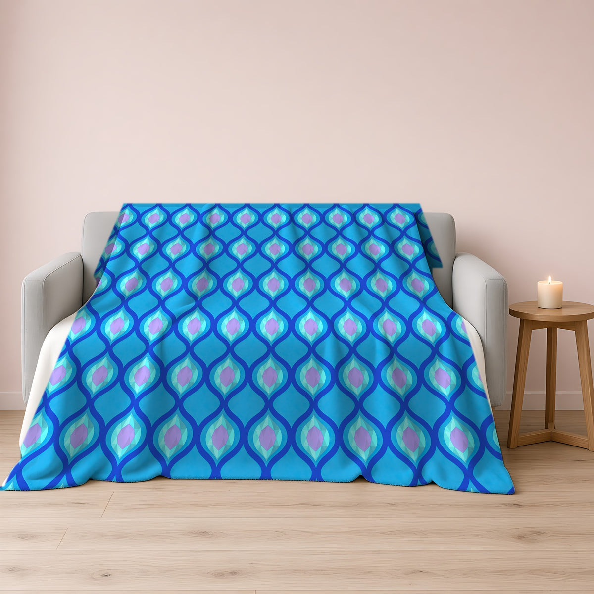 Grand Ogee Lattice II Sherpa Fleece Blanket draped over a grey sofa