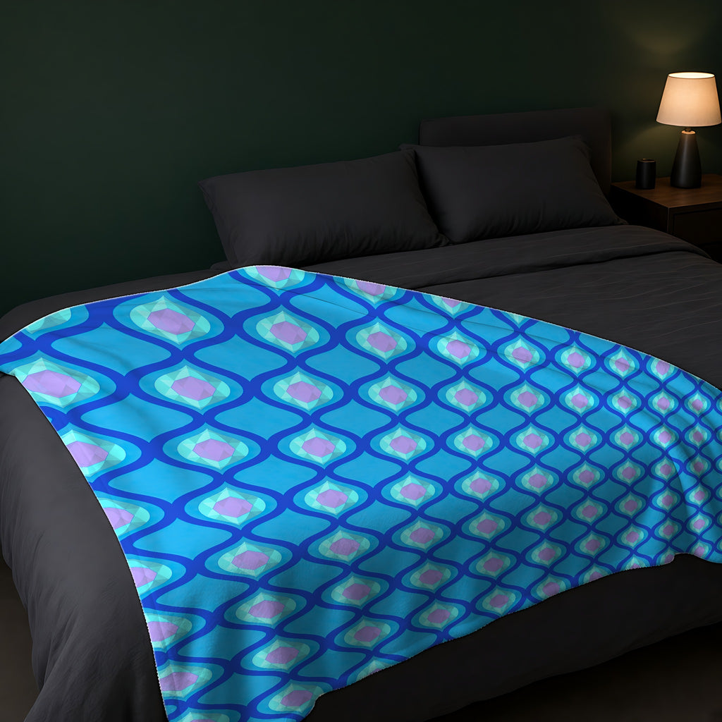 Grand Ogee Lattice II Sherpa Fleece Blanket across the foot of a dark bed