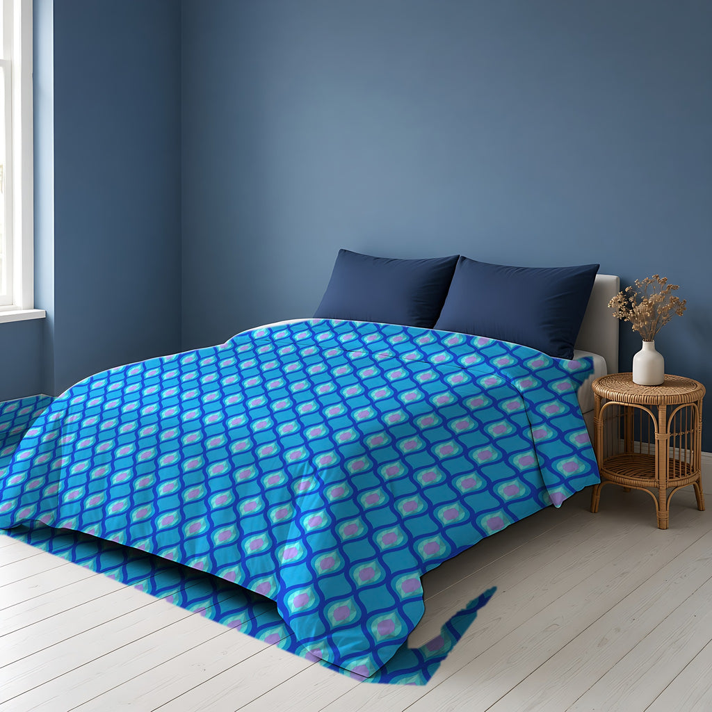 Grand Ogee Lattice II Comforter on a bed in a Scandinavian blue bedroom