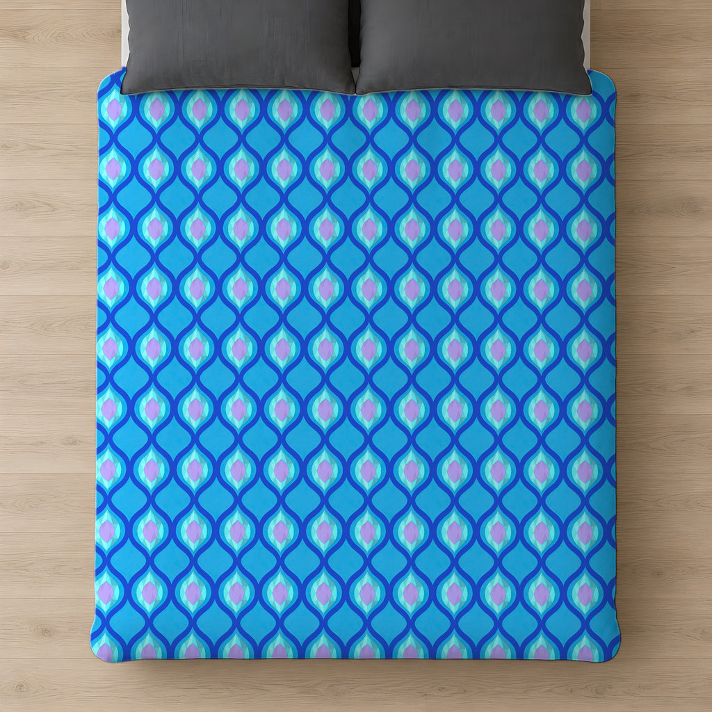 Grand Ogee Lattice II Comforter on a bed, seen from above