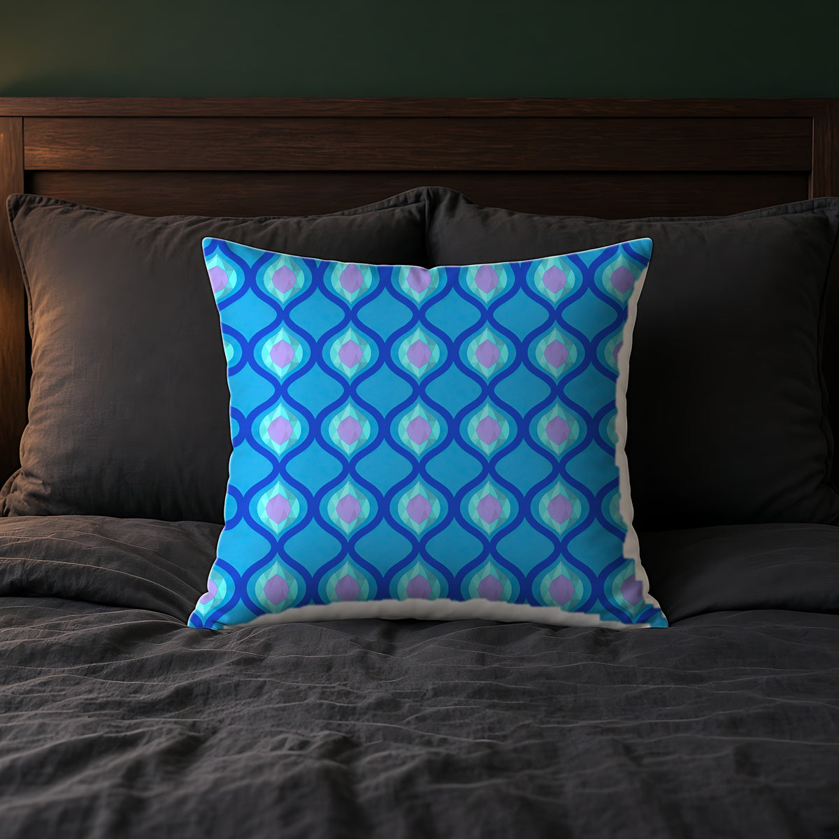 Grand Ogee Lattice II Faux Suede Cushion on a bed with charcoal bedding