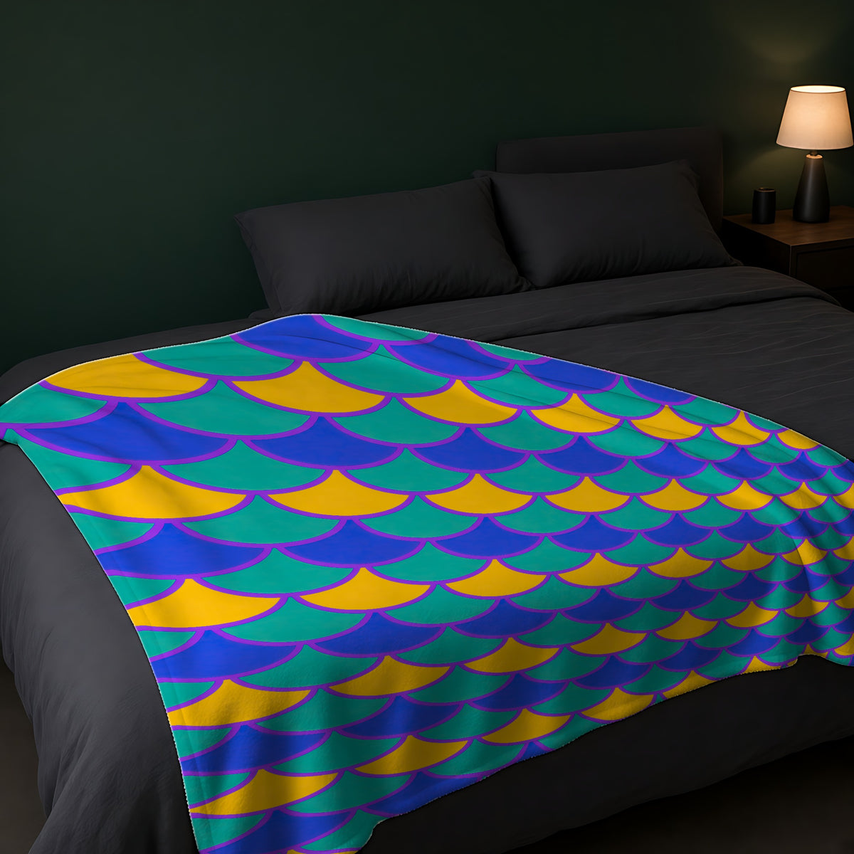 Big Jewel Scales II Sherpa Fleece Blanket across the foot of a dark bed