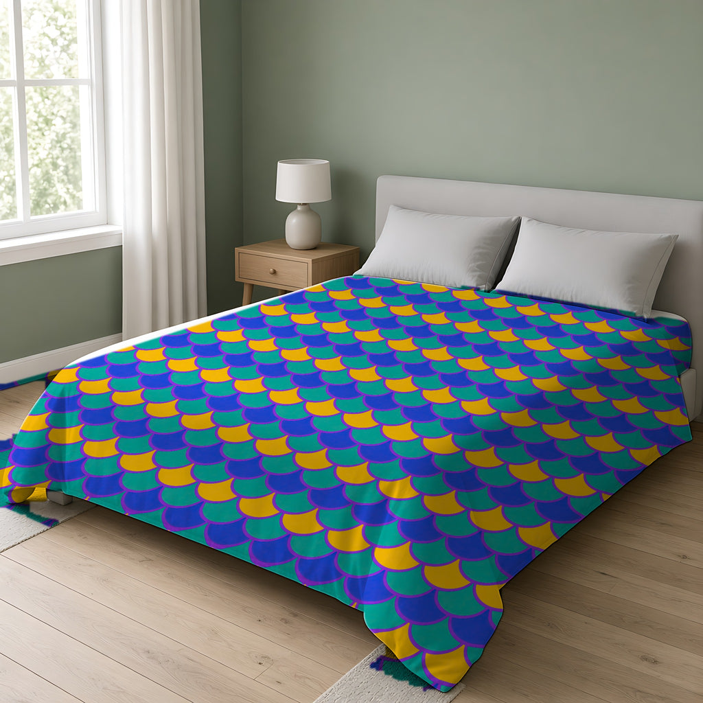 Big Jewel Scales II Comforter on a double bed in a bright sage-green bedroom