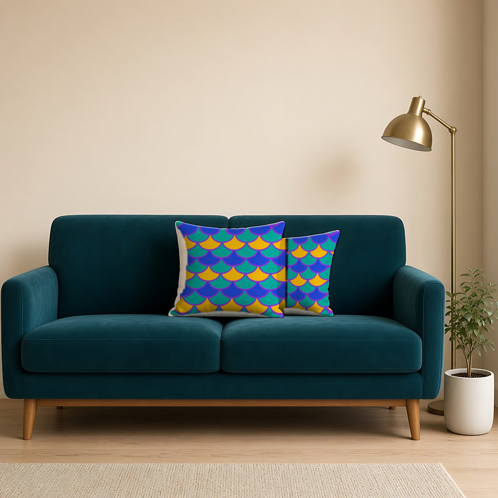 Big Jewel Scales II Faux Suede Cushion on a teal velvet sofa