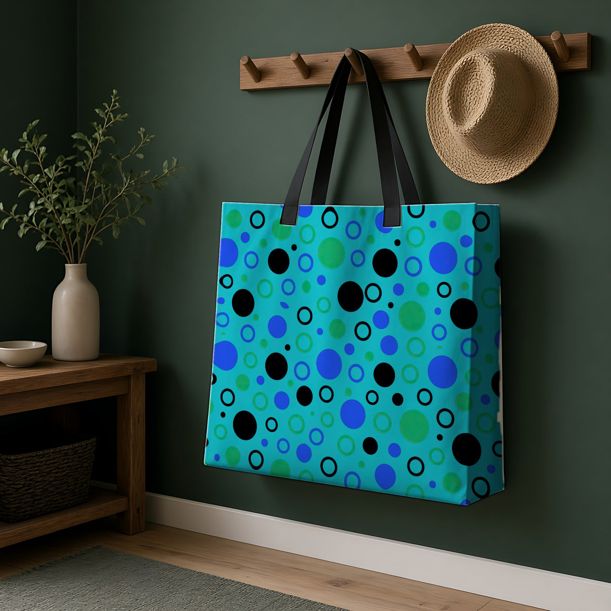 Bubble Outlines Weekender Tote Bag hanging on a peg rail in a green hallway